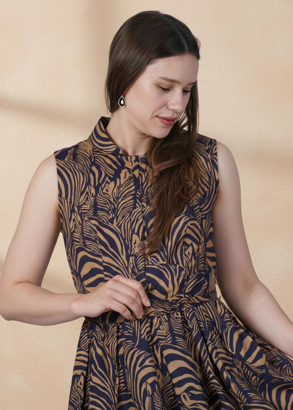 Model wearing Linen Enchantment Dress close-up of collared neckline and linen print detail.