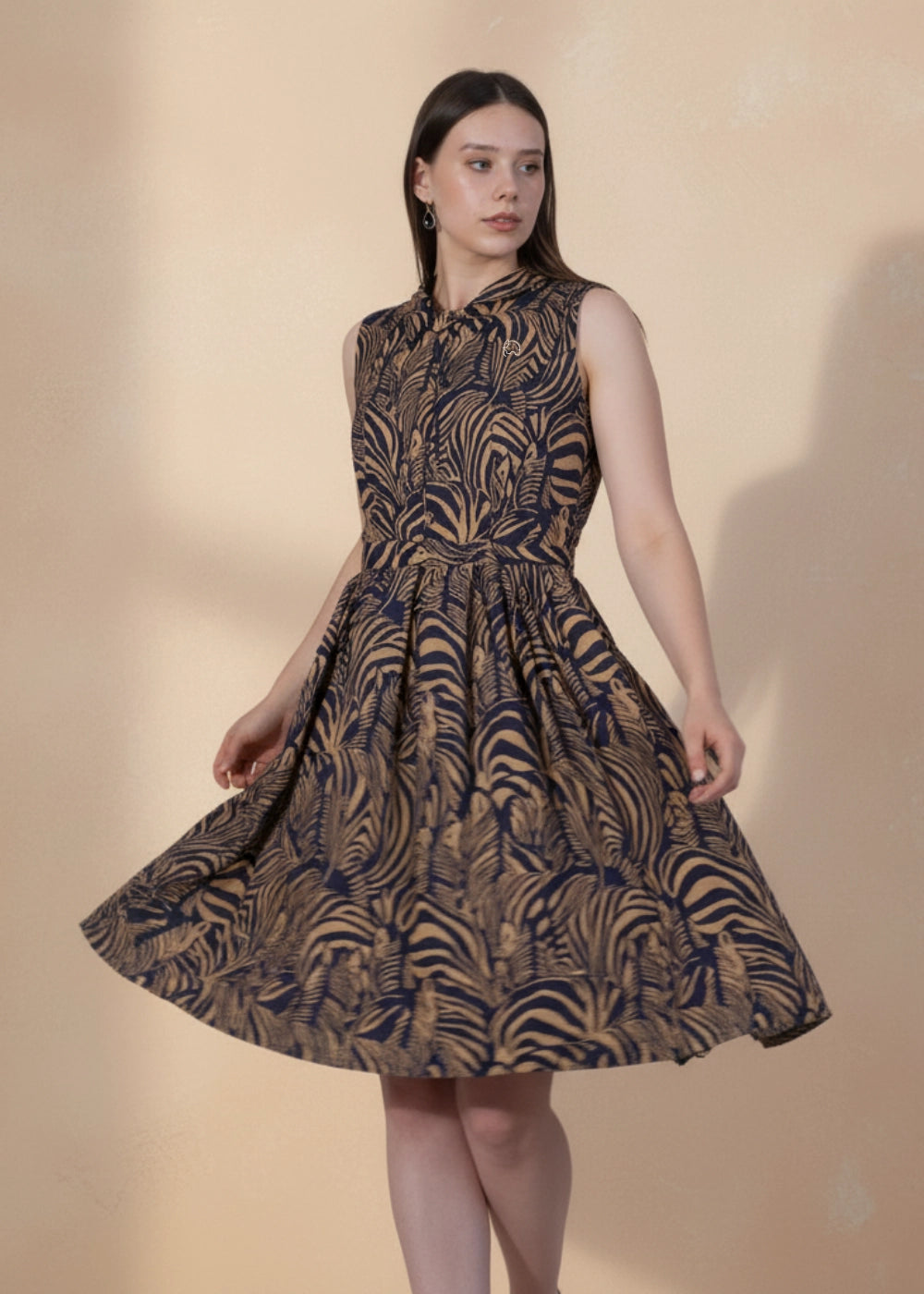 Model wearing Linen Enchantment Dress — close-up of collared neckline and linen print detail.